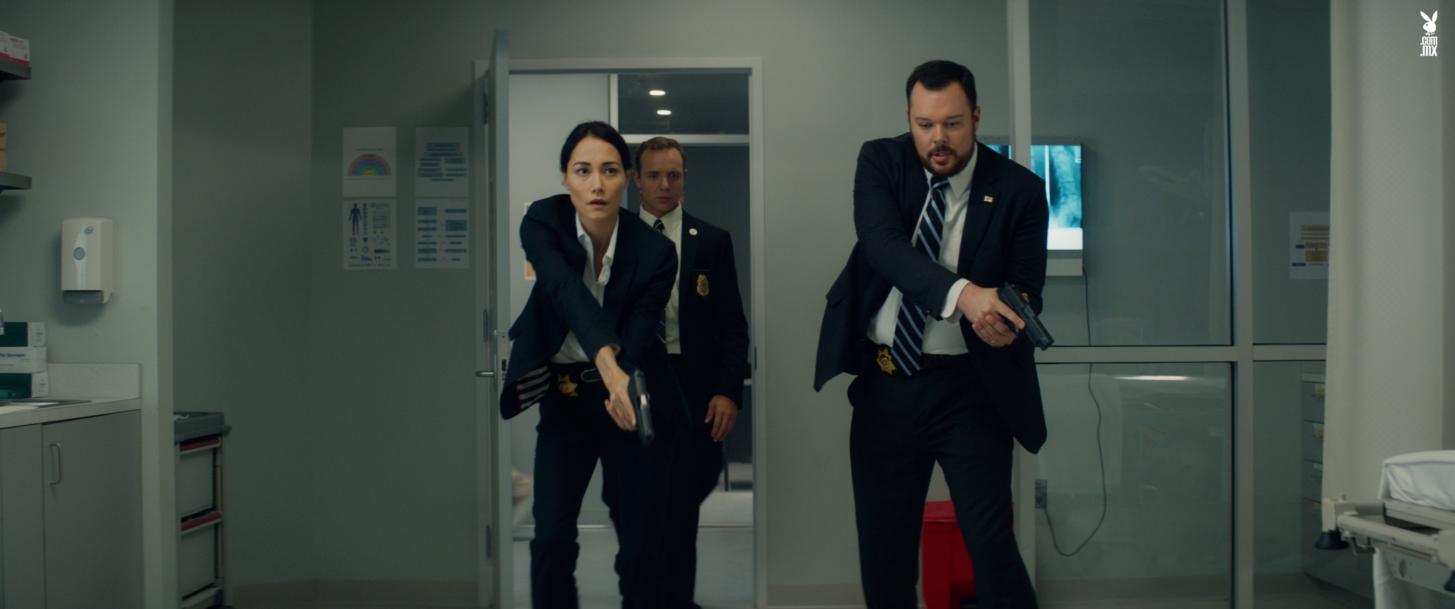 Left to right: Sandrine Holt plays Detective Cheung, Griff Furst plays Agent Burke, and Michael Gladis plays Lieutenant Matias in Terminator Genisys from Paramount Pictures and Skydance Productions.