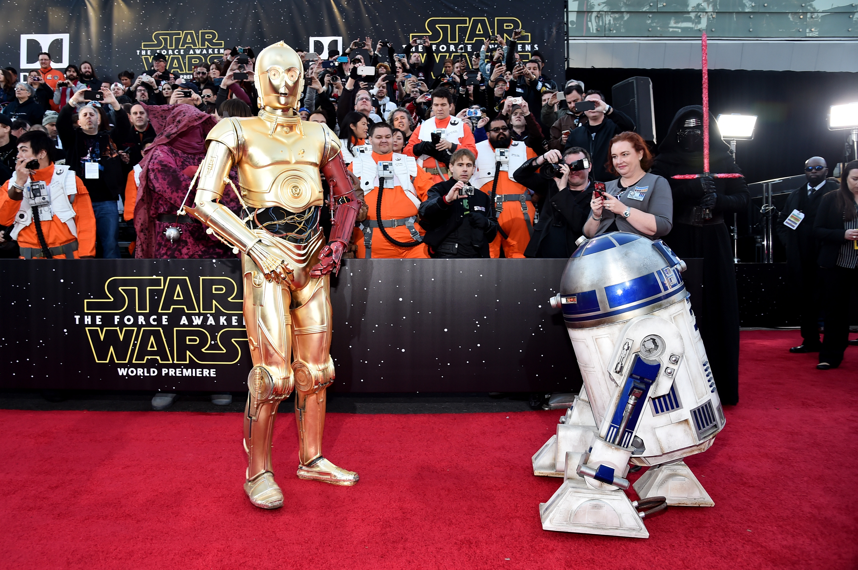 HOLLYWOOD, CA - DECEMBER 14: R2-D2 (L) and C-3PO attend the World Premiere of Star Wars: The Force Awakens at the Dolby, El Capitan, and TCL Theatres on December 14, 2015 in Hollywood, California. (Photo by Alberto E. Rodriguez/Getty Images for Disney) *** Local Caption *** R2-D2;C-3PO