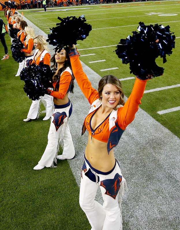 Denver Broncos cheerleaders perform prior to an NFL football game against the Green Bay Packers, Sunday, Nov. 1, 2015, in Denver. (AP Photo/Jack Dempsey)